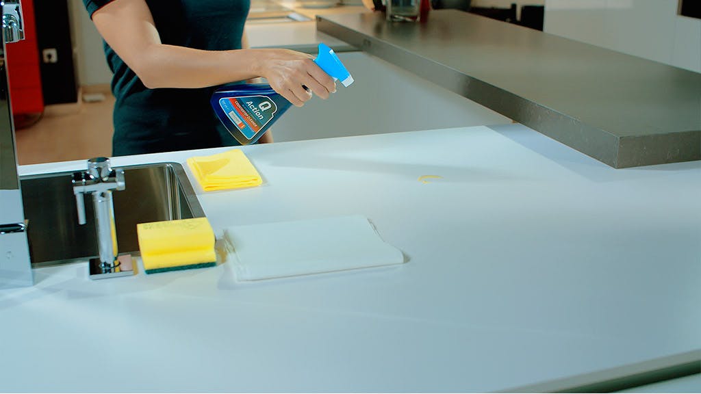 Silestone Quartz Surface Maintenance - Apply a common home cleaning product to the stain. Leave cleaner on surface  for two minutes.